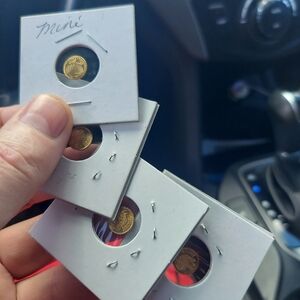 Half of gram of gold  7